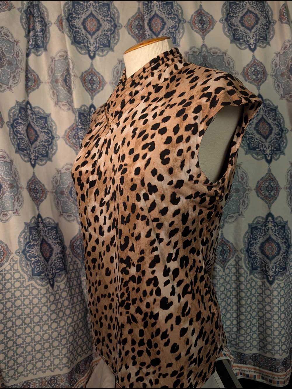 animalistic sleeveless tunic | Calvin Kleins business + gold accents